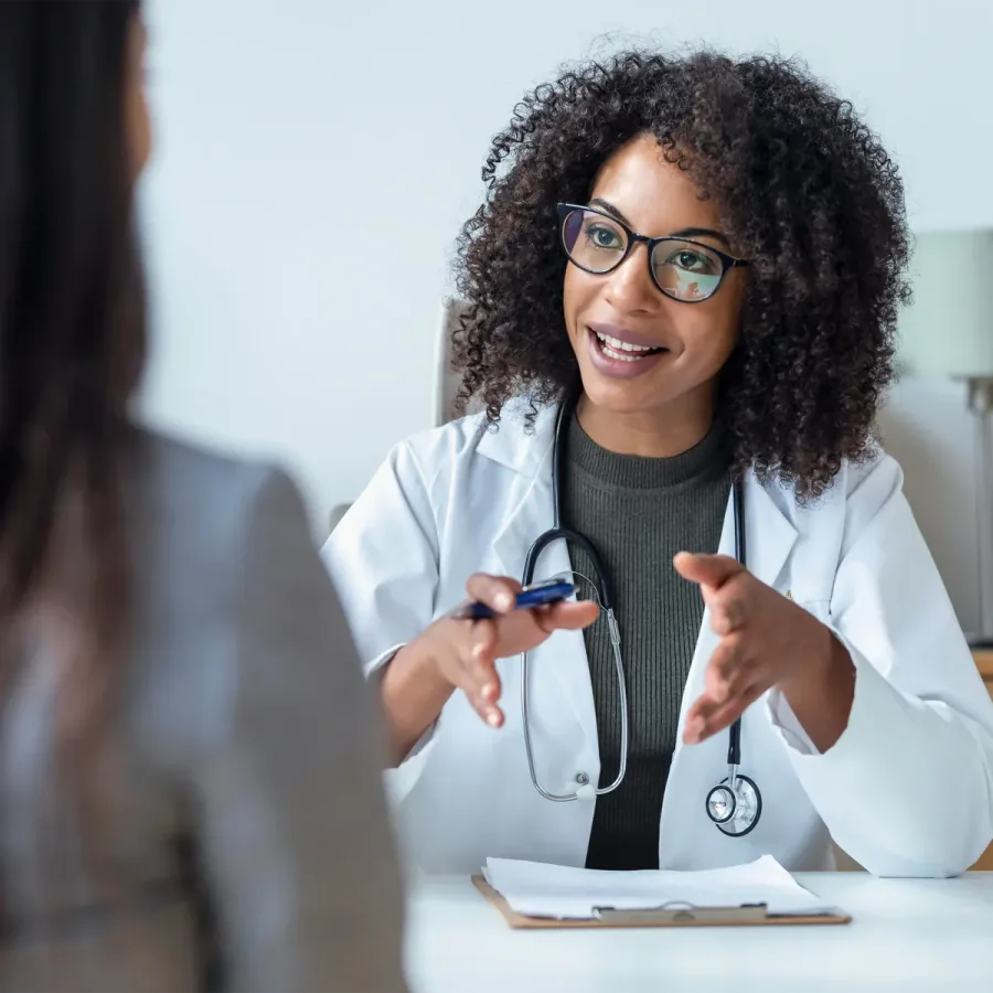 Physician consulting with a patient